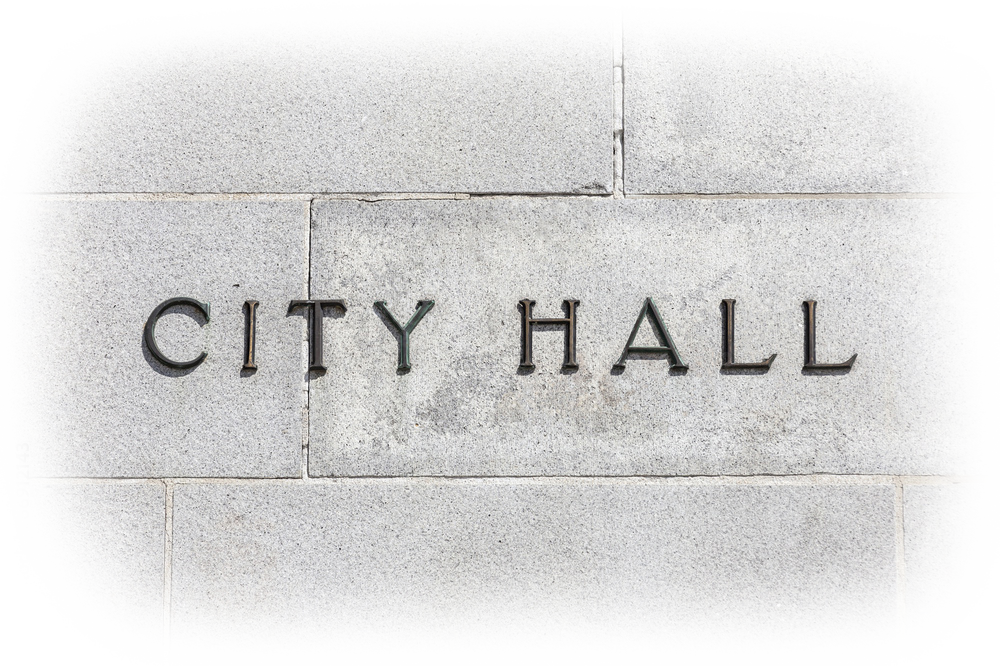 City Hall sign on stone building